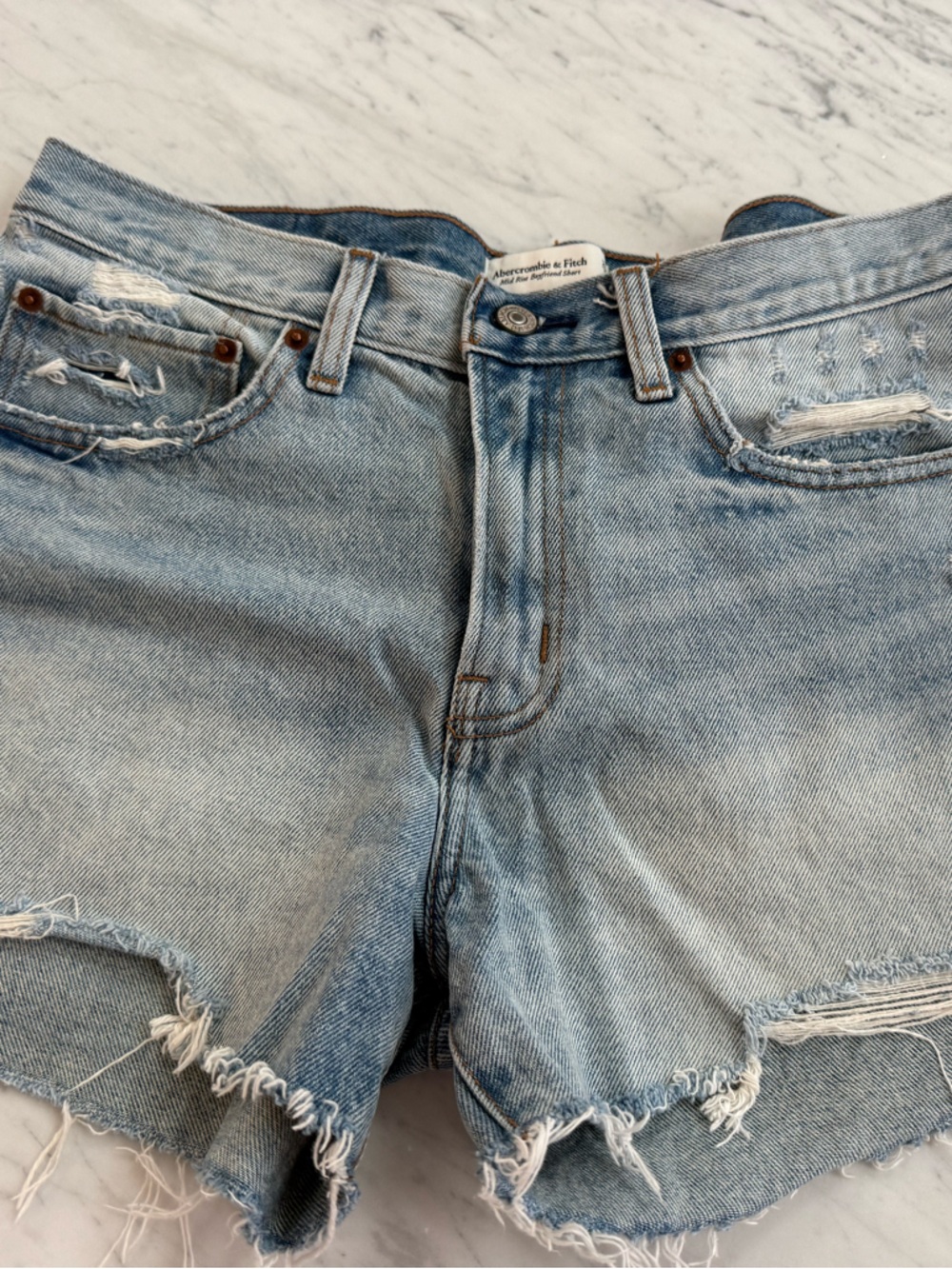Abercrombie & Fitch light blue denim shorts with frayed trim